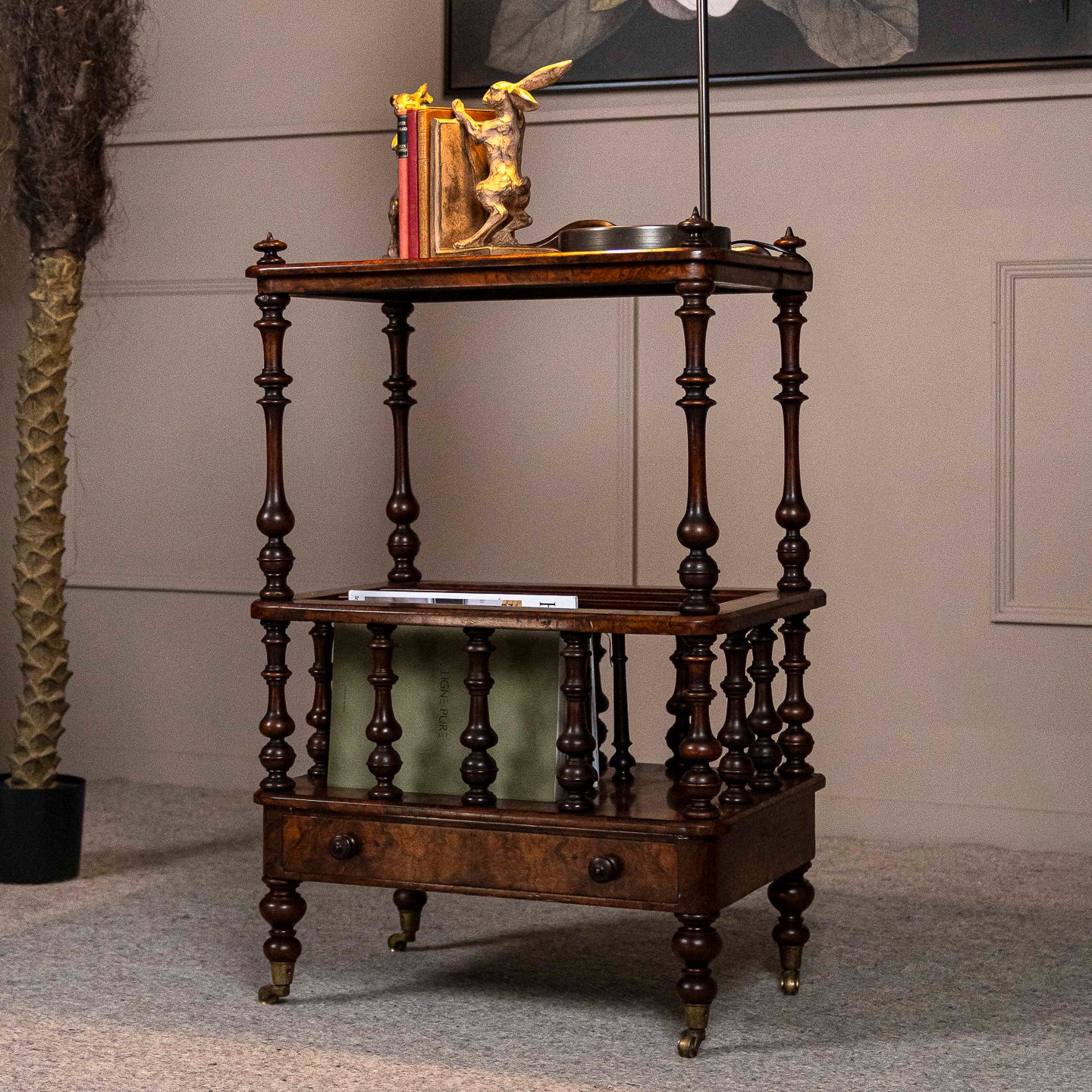 Burr Walnut Canterbury with drawer and brass castors